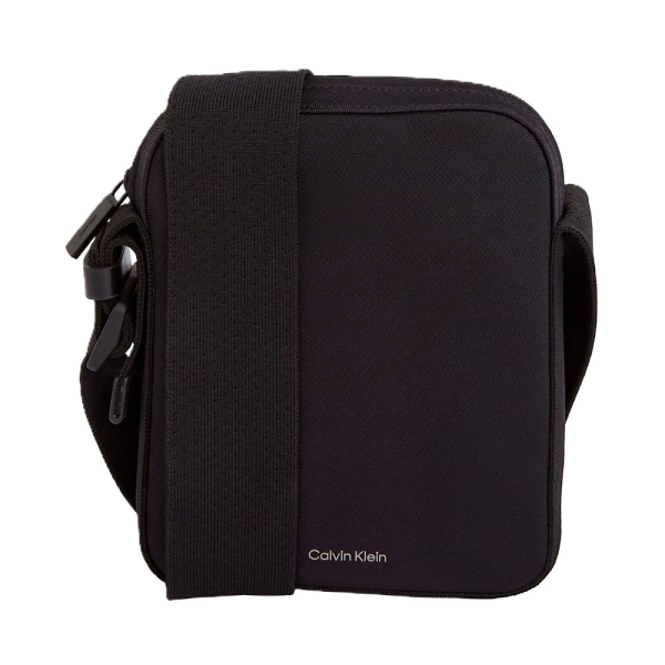 Calvin Klein SAC BANDOULIRE EASE REPORTER S - U Noir- Ref 56 €
