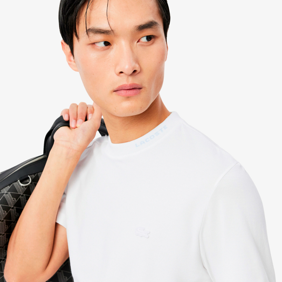 pique-t-shirt-mit-jacquard-branding-details