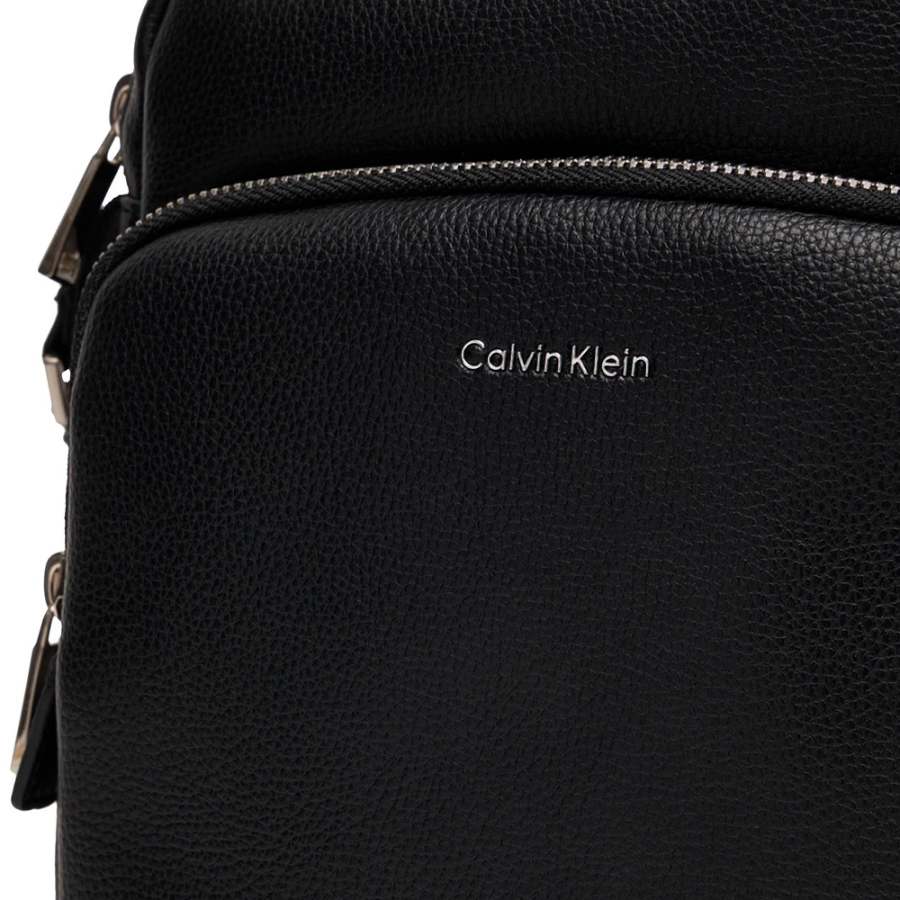 raised-pocket-reporter-crossbody-bag