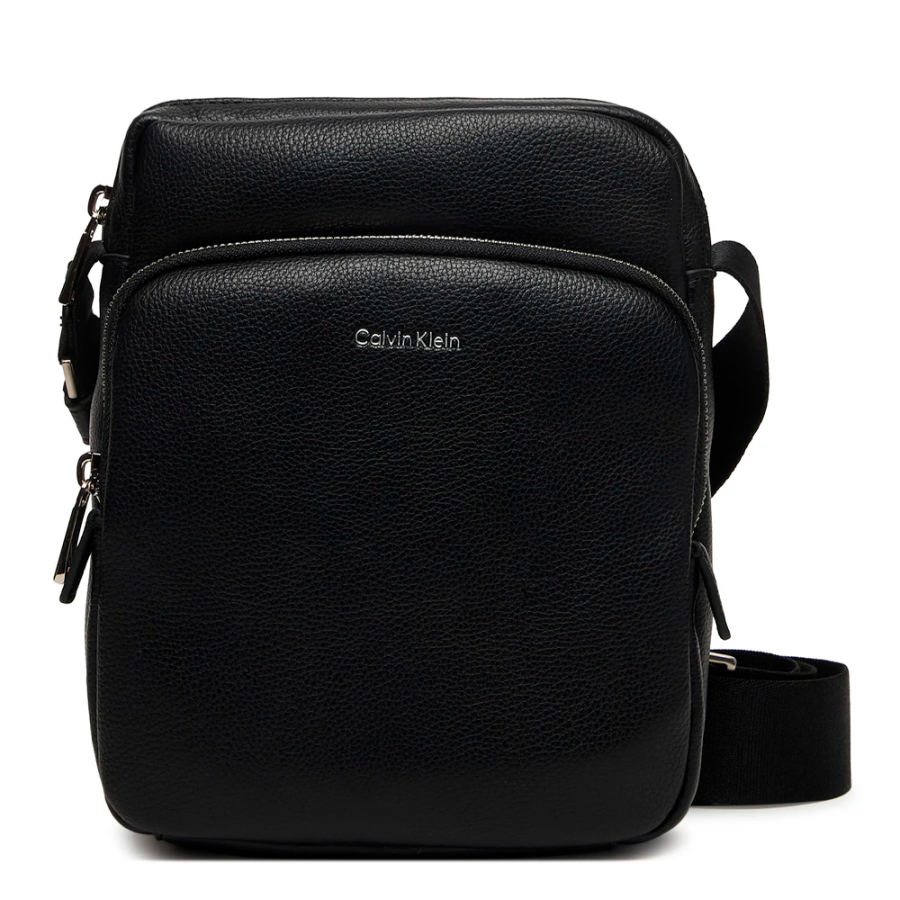 raised-pocket-reporter-crossbody-bag