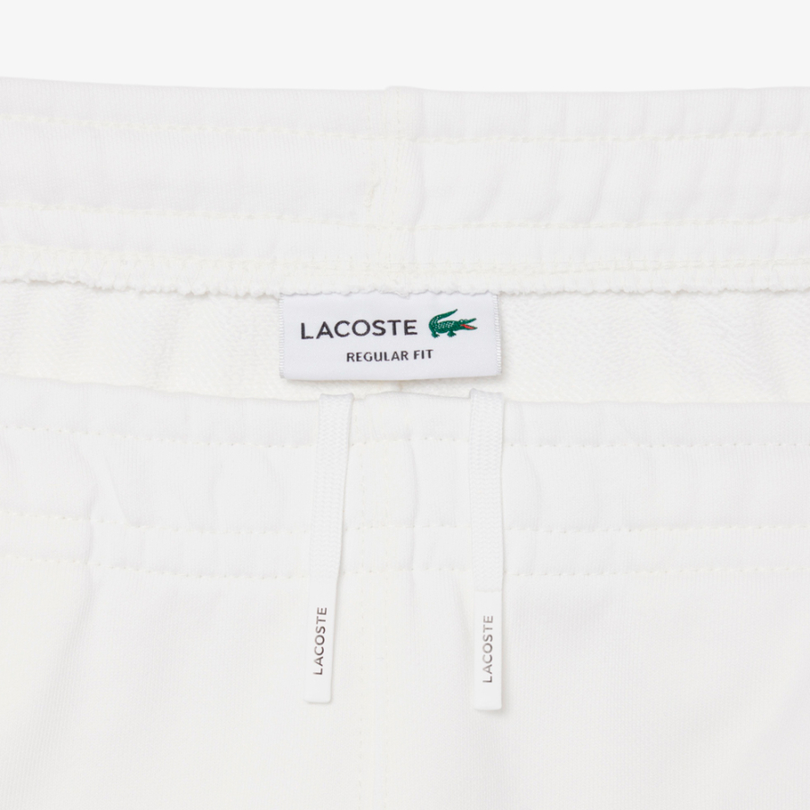 short-de-corte-regular-con-raya-de-logotipo short-de-corte-regular-con-raya-de-logotipo