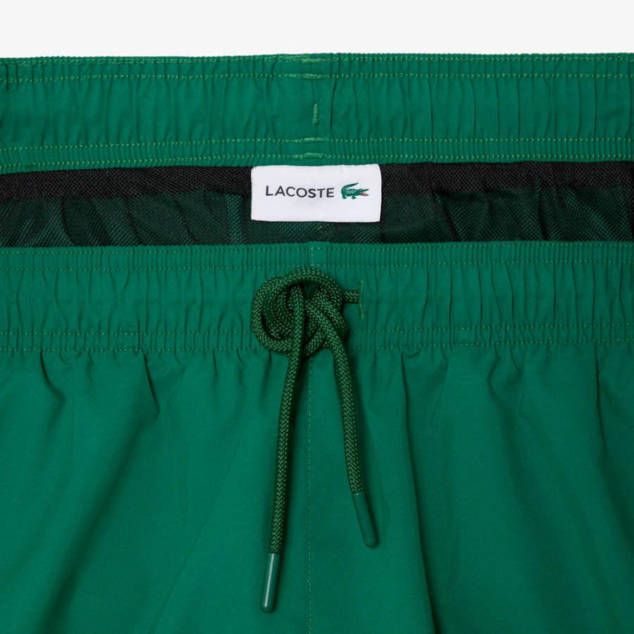 pantaloncini-da-bagno-monocromatici-di-media-lunghezza pantaloncini-da-bagno-monocromatici-di-media-lunghezza