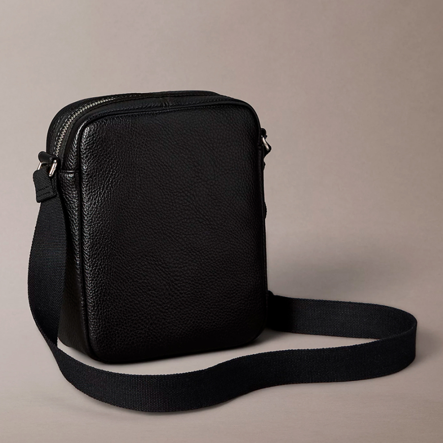 bolso-reporter-logo-monograma