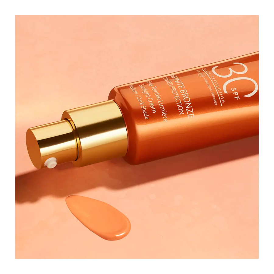 infinite-bronze-protector-solar-facial-spf30-con-maquillaje